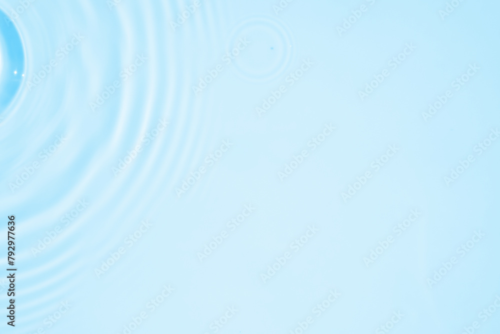 Abstract transparent water shadow surface texture natural ripple on blue background Abstract transparent water shadow surface texture natural ripple on blue background