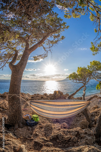 Hammock net installed on Punta Rata beach in Brela, Croatia, Dalmatia, Croatian azure coast. © Tomas Marek
