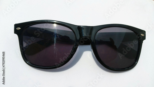 Black Beautiful sunglasses on white background © Nayan