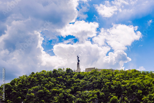 View of Hungarian Statue of Liberty against blue sky with beautiful white clouds, Budapest, Hungary