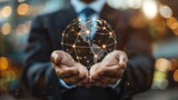 Closeup of businessman delicately holding a globe with intricate connections, set against a blurred business background