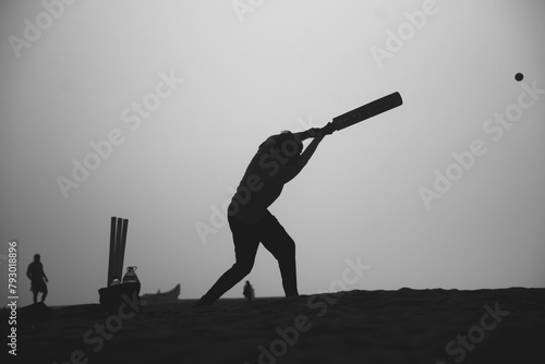 Cricketer black and white silhouette photo