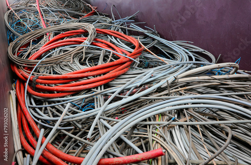 discarded electrical cords at the electrical cord scrapyard for recycling copper and polluting plastic