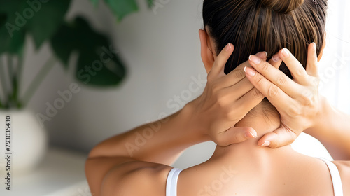 Pain in the neck muscle of Caucasian woman. Nape pain and nuchal stiffness concept. photo