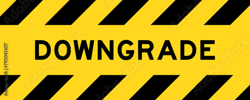 Yellow and black color with line striped label banner with word downgrade