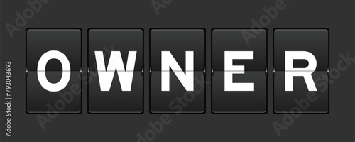 Black color analog flip board with word owner on gray background