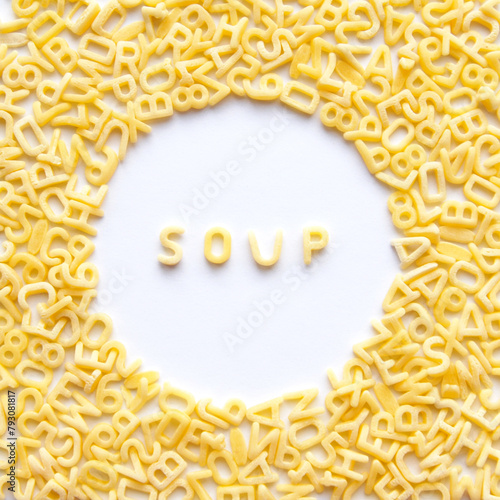 A word soup in the centre surrounded by alphabet pasta
