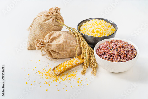 Mixed grains and mixed grain porridge on monochrome background