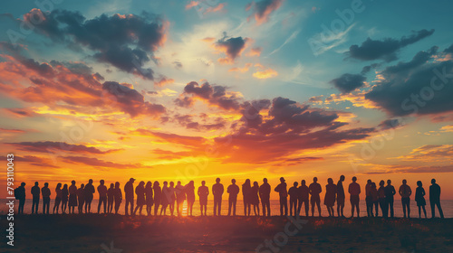 Group of people silhouette standing against vibrant sunset over sea. Sky rich colors create backdrop that speaks to end of day and closeness of community photo