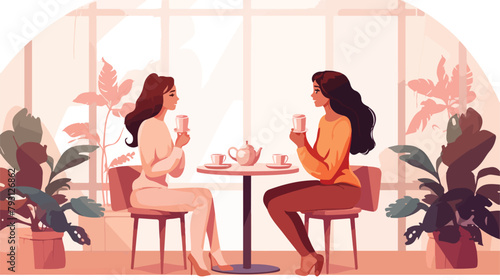 Two young women drinking coffee in the cafe restaur