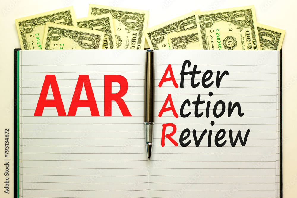 Fototapeta premium AAR After action review symbol. Concept words AAR After action review on beautiful white note. Dollar bills. Beautiful dollar bills background. Business AAR after action review concept. Copy space.