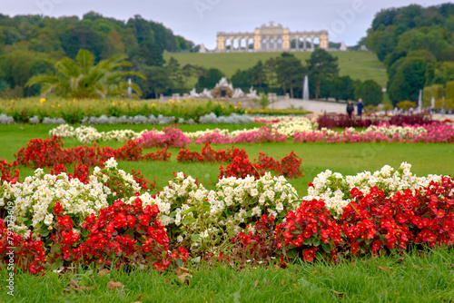 Schoenbrunn Palace Garden Flowers Vienna Austria. The flowers and gardens, with the Gloriette in the background, on the grounds of Schonbrunn Palace. Vienna, Austria.

 photo