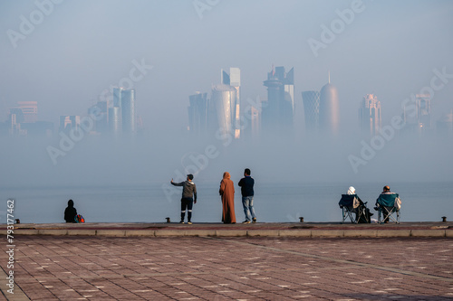 Doha, Qatar - September 09, 2023: Doha Corniche in foggy morning. No face photo