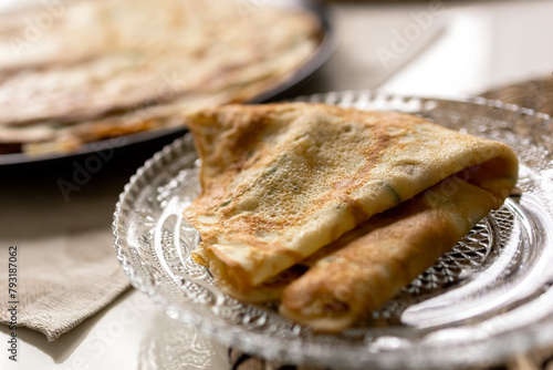 Pancake on a glass plate. Photo