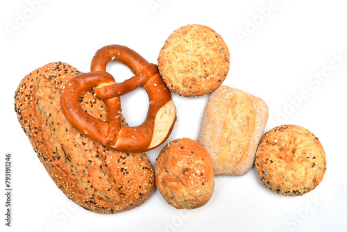 Collection of bread and rolls with grains on a white background