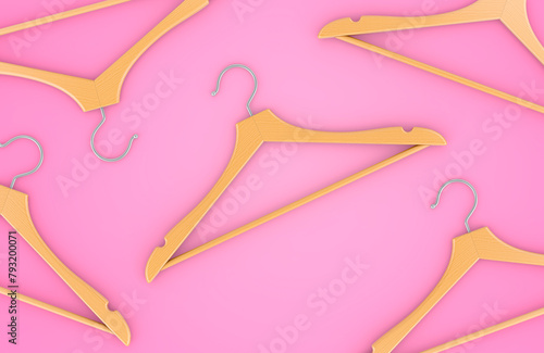 Wood Hangers on the pink backdrop, top view. 3D rendering