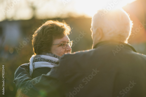 Senior Man and a Woman Standing Next to Each Other
