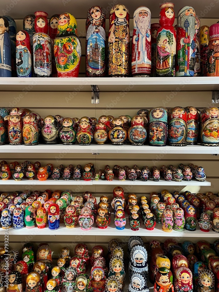 Naklejka premium Colorful wooden dolls in the store