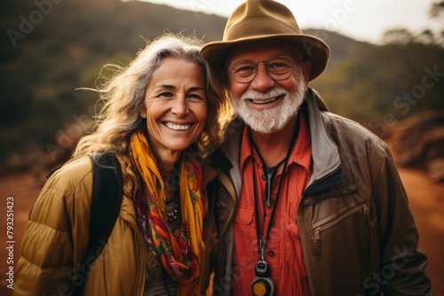 Happy senior couple enjoying a hike in nature