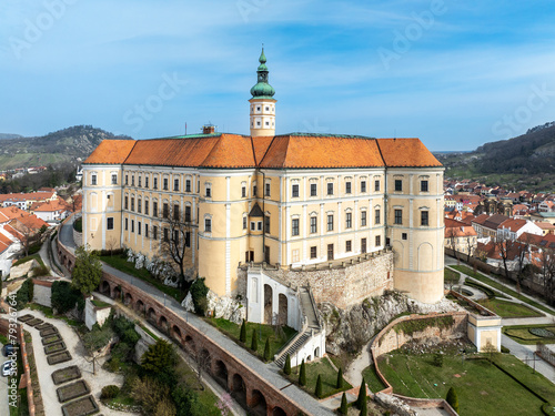 Mikulov castle in South Moravia, Czech Republic. Build  on a rock. Originally medieval, reconstructed in 18th century and renovated in 1950s. Aerial view with stairs, arcades, and garden