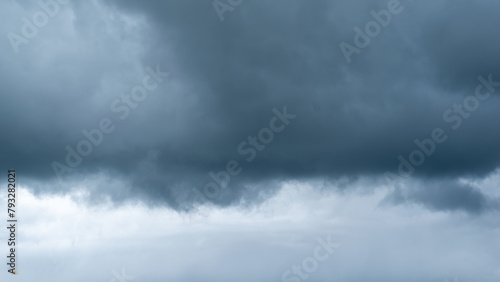 Stormy sky, dark sky with heavy clouds converging and a violent storm before the rain, A rainy dark sky, Stormy clouds