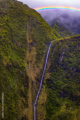Kaaui, Hawaii rainbow over waterfall © John