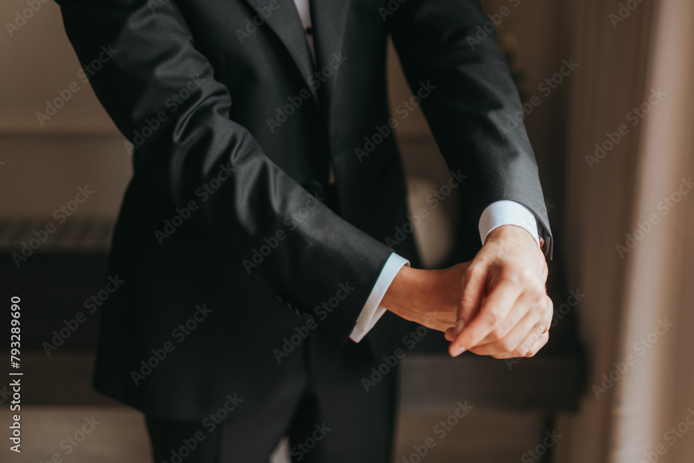 Guy is getting dressed for a business meeting. Guy is getting dressed for a business meeting.