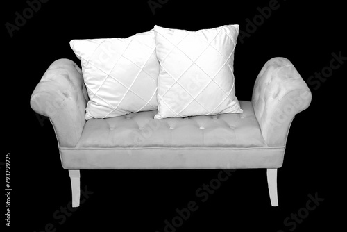 Vintage leather material ottoman furniture with white pillows isolated on black