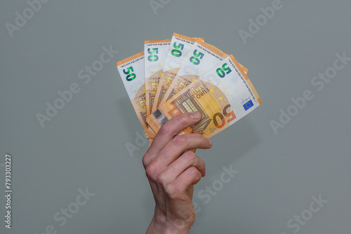 woman holds in hands euro cash money