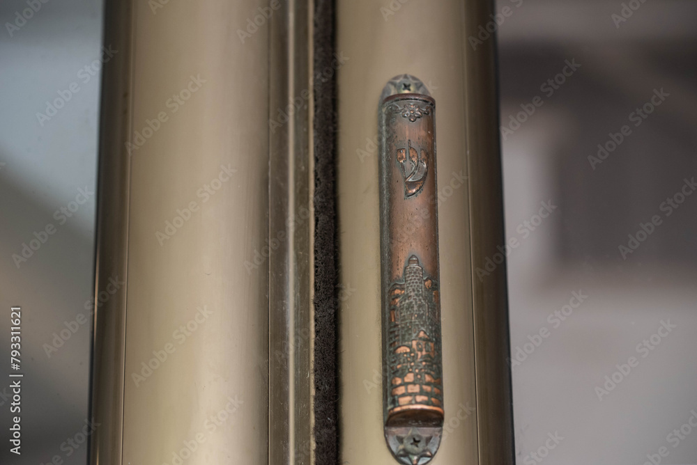 Jewish mezuzah on the doorpost, a prayer for home protection in Judaism. Modern mezuzah in Israel. Jewish mezuzah on the doorpost, a prayer for home protection in Judaism. Modern mezuzah in Israel.