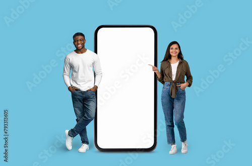 Pair posing with immense smartphone display mockup