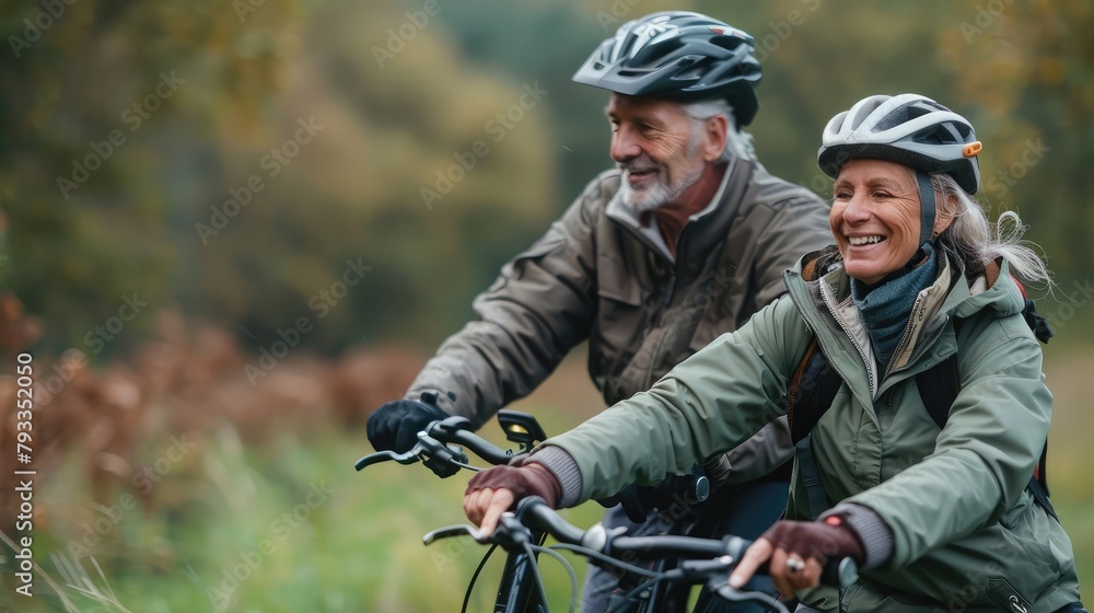 man and woman enjoying a leisurely bike ride together through a scenic countryside, smiling and chatting along the way.