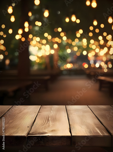 photo wooden table and blurred background of outdoor restaurant with bokeh light