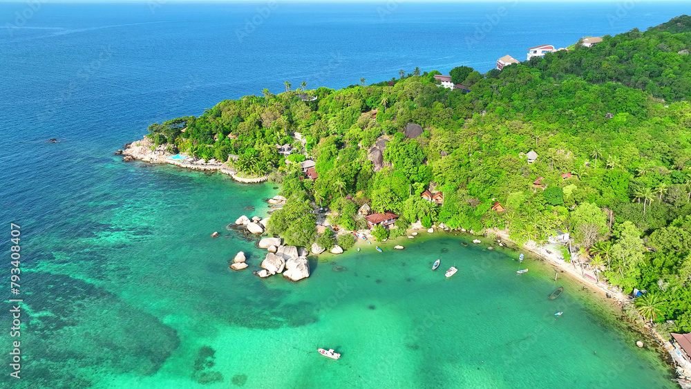 Koh Tao is a haven for thrill-seekers with its rugged coastline, diverse marine life, and world-class diving sites, promising unforgettable adventures under the sea. Flight over the ocean.
