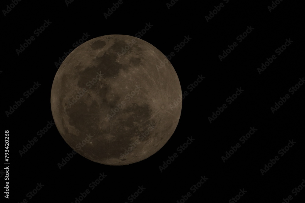The full moon is a lunar phase that occurs when the Moon is completely illuminated as seen from Earth. This happens when the Earth is directly between the Sun and the Moon The full moon is a lunar phase that occurs when the Moon is completely illuminated as seen from Earth. This happens when the Earth is directly between the Sun and the Moon