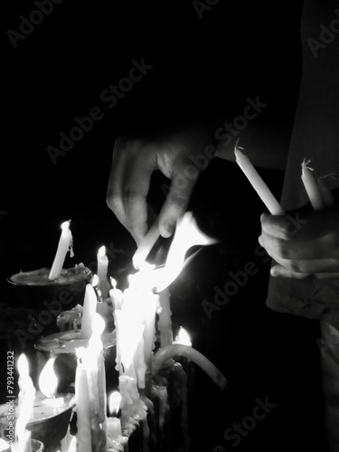 Candles being lit for Easter in the Philippines