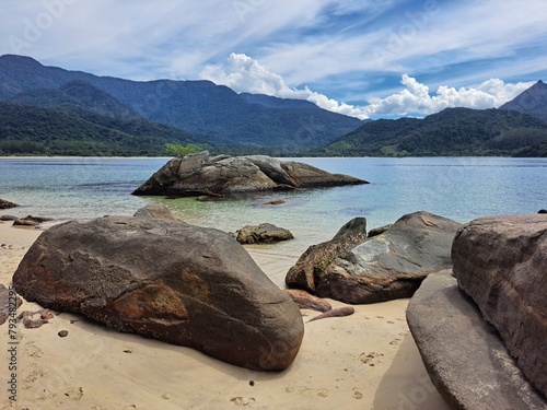 Wallpaper Mural Pelado Island in Paraty, mountains in the background,sky with clouds, large rocks, and calm sea. Natural swimming pool and warm water Torontodigital.ca