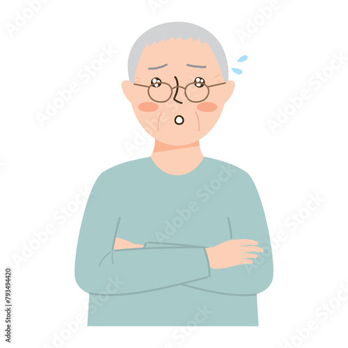 腕を組んで困惑する男性