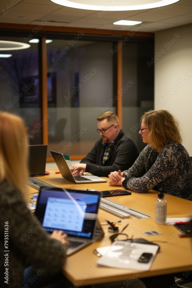 Professional Photography of employees gathered around a conference table with laptops and documents, discussing strategies and problem-solving late, Generative AI Professional Photography of employees gathered around a conference table with laptops and documents, discussing strategies and problem-solving late, Generative AI