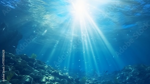 Small canyon underwater carved by the swell into the fore reef with sunlight through water surface