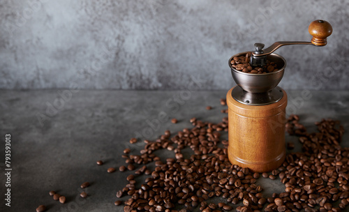 coffee grinder and coffee beans © mnimage