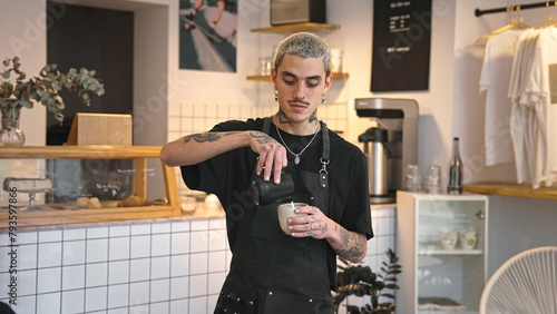 Obraz na płótnie Handsome barista guy work coffee shop