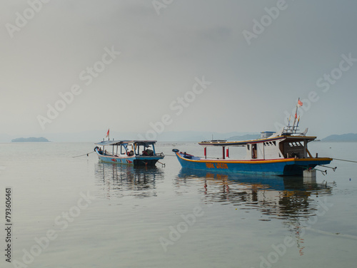 ishing boats that cannot go to sea because the water is receding photo