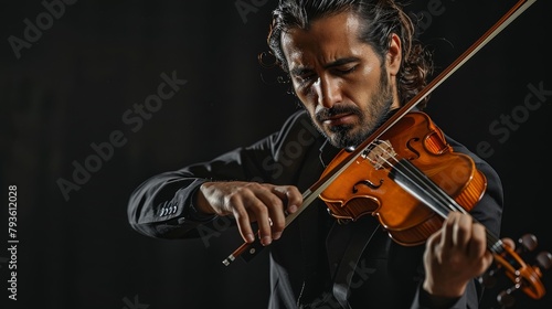 A musician in performance attire, playing a violin, emotionally intense and focused, against a simple black background, styled as a classical music portrait.
