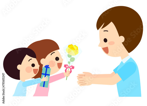 お父さんへ父の日の贈り物を渡す子供達
