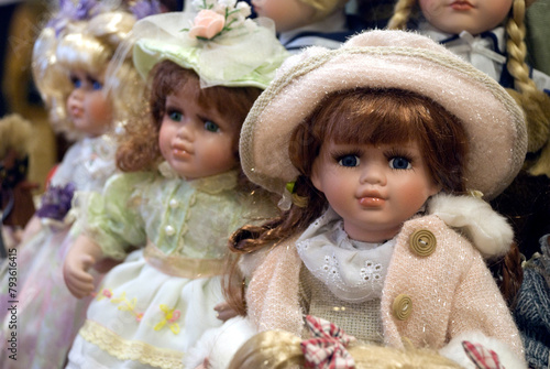Doll collection in a bedroom