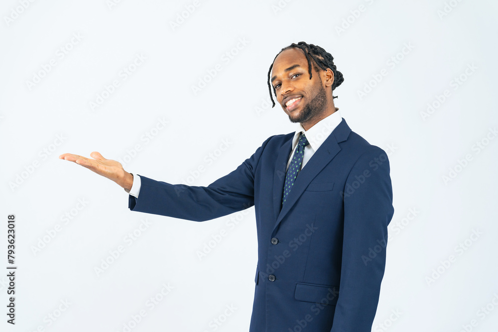A black male businessperson guiding in front of a white background