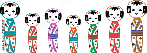 カラフルなかわいい笑顔のこけし人形