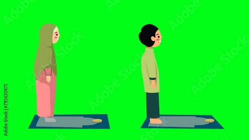 2d animated cartoon Muslim boy and girl characters praying in the mosque in green screen chroma key. 4K resolution. photo