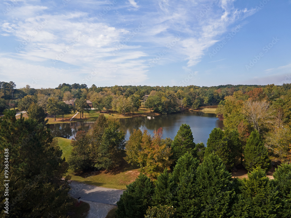 Aerial sunset landscape of forest and lake in rural neighborhood CSRA Grovetown Augusta Georgia Aerial sunset landscape of forest and lake in rural neighborhood CSRA Grovetown Augusta Georgia